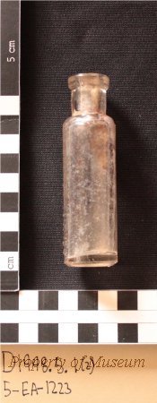 2. Small Medicine Bottle. Molded Glass w/ Turned Lip.