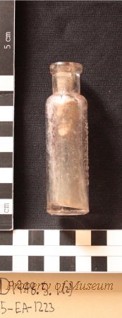 2. Small Medicine Bottle. Molded Glass w/ Turned Lip.